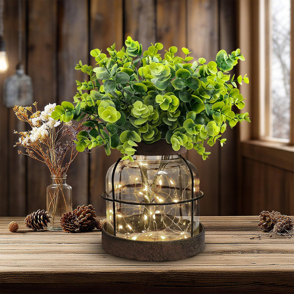 Swarenly rustic farmhouse vase closeup with eucalyptus and lights ideal centerpiece