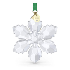 Swarovski Annual Edition Ornament 2026 geometric snowflake on green ribbon adds festive sparkle.