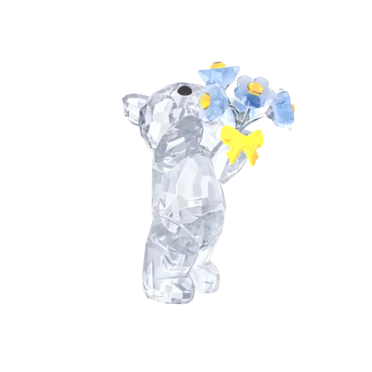 Swarovski Kris Bear bouquet featuring forget-me-not blossoms enhances color in display.