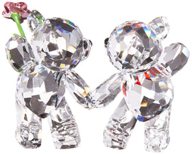 Swarovski Kris Bears red heart and pink flower highlight a meaningful keepsake for celebrations.