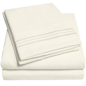 Sweet Home Collection 1500 Supreme Queen Ivory Sheet Set on a bed with hotel-like luxury.