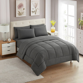 Sweet Home Collection comforter on bed in gray, plush warmth for all-season comfort.