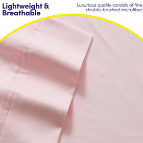 Sweet Home Collection queen sheets pale pink in a cozy bedroom setting.