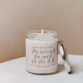 Sweet Water Decor 9oz jar with gold lid; stylish centerpiece for shelves.