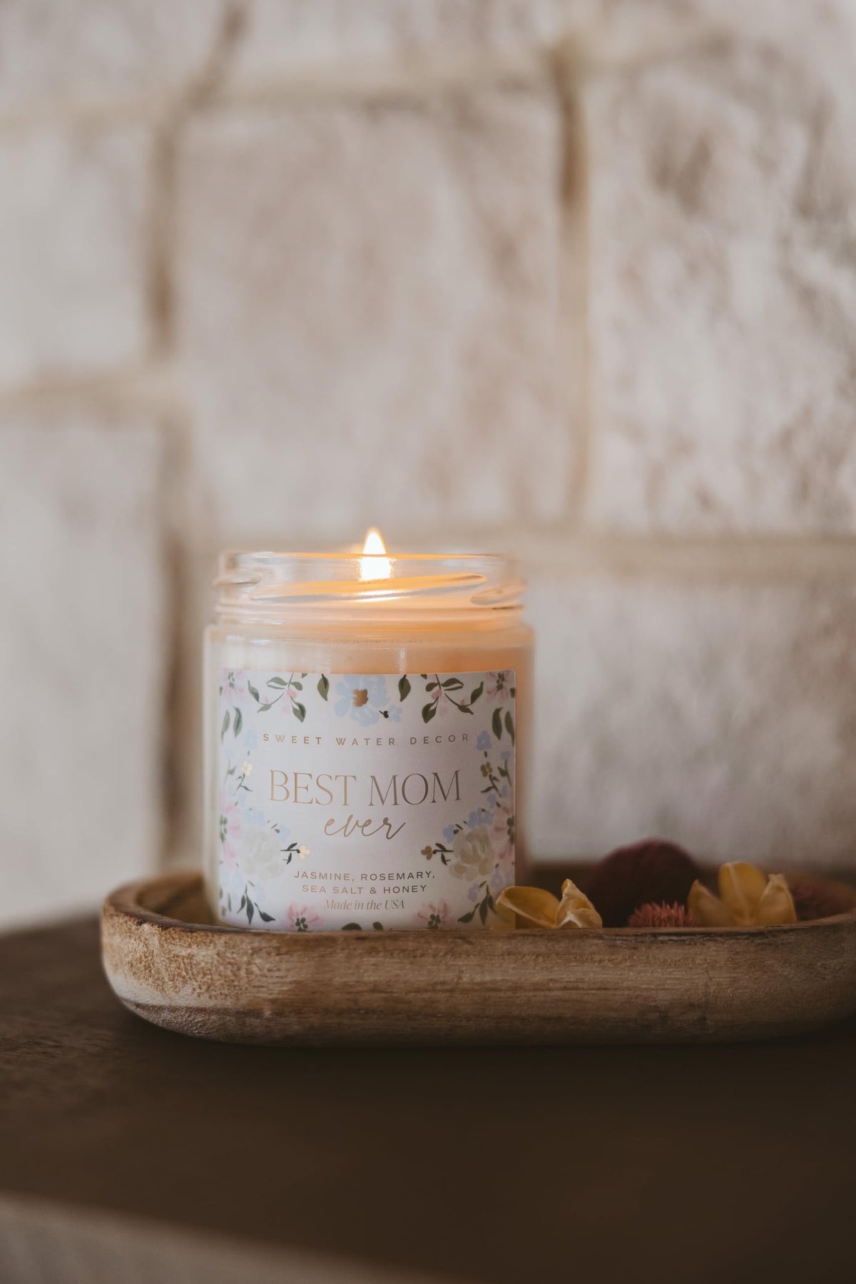 Sweet Water Decor Bedroom decor with soft glow from the candle