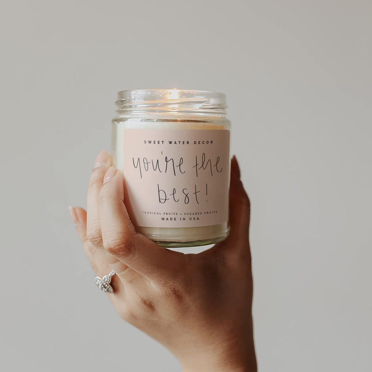 Sweet Water Decor You're The Best Candle 9oz jar sits elegantly on a shelf