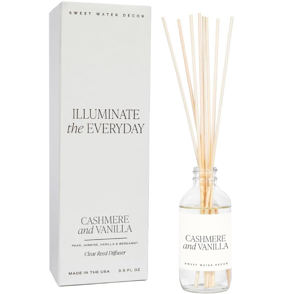 Sweet Water Decor cashmere vanilla bottle releasing a soft, inviting fragrance.