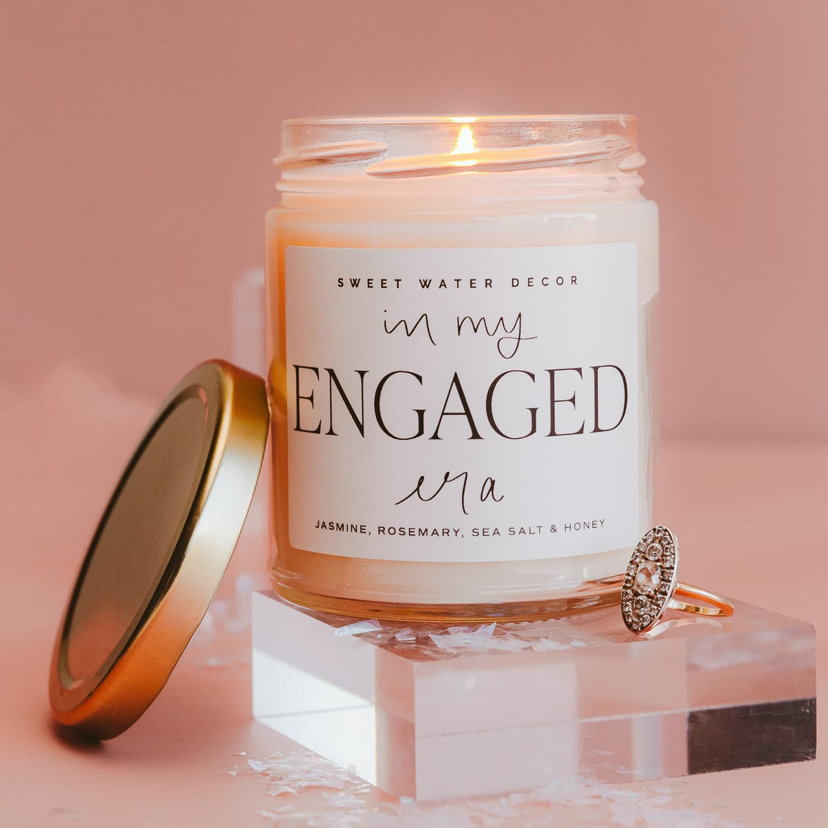 Sweet Water Decor Engaged Era Candle scent map highlights lemon and jasmine notes for ambience.