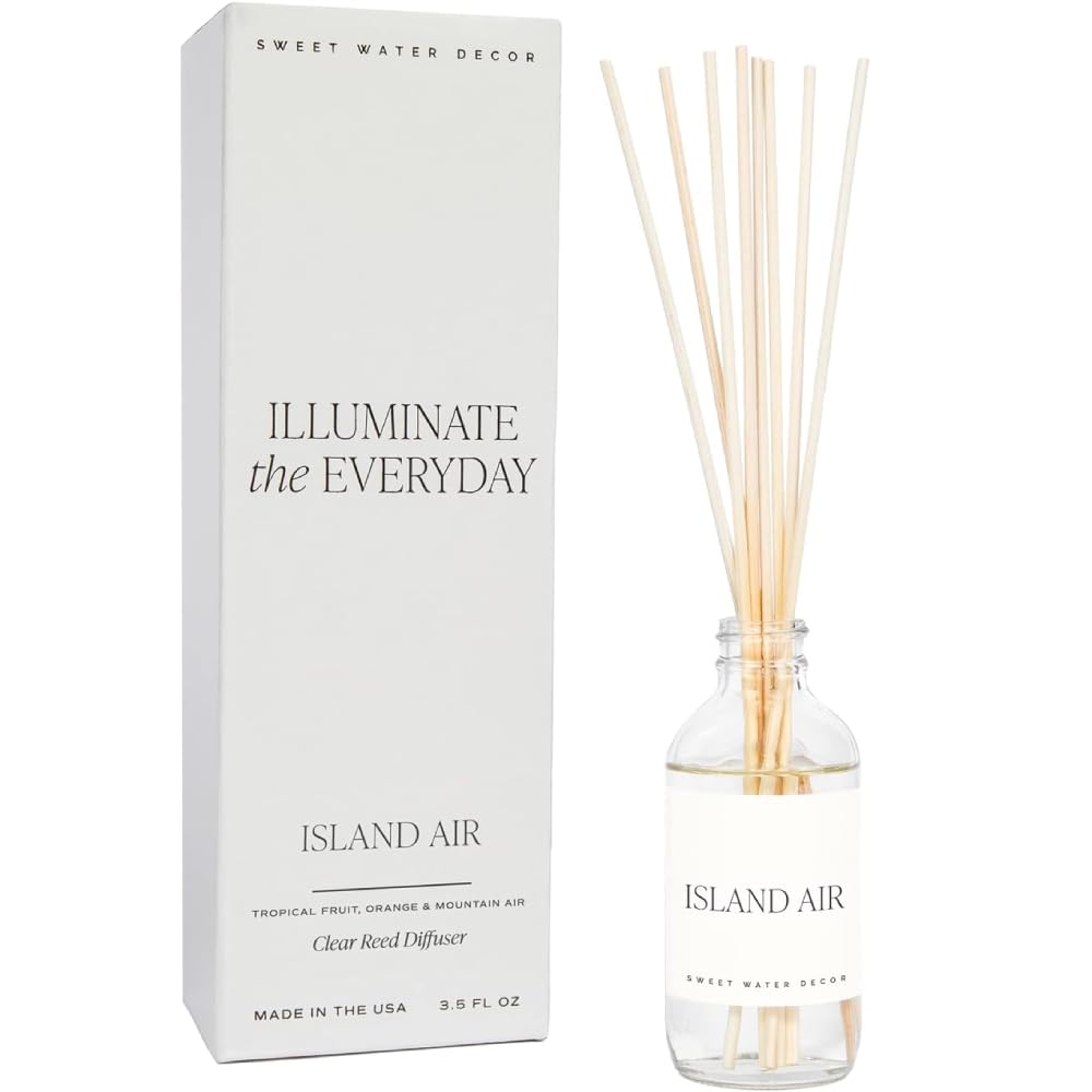 Sweet Water Decor Island Air reed diffuser setup enhances room ambiance.