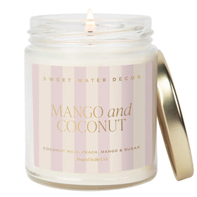 Sweet Water Decor mango-coconut-pattern candle in a clear jar for tropical bathroom ambiance.
