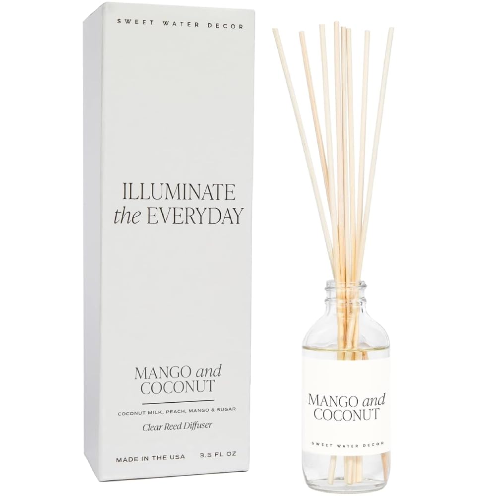 Sweet Water Decor mango coconut reed diffuser bottle adds tropical freshness to any room.