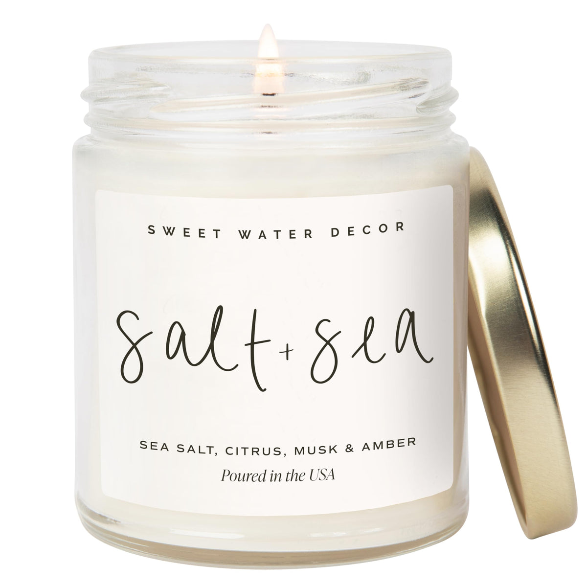 Sweet Water Decor Salt and Sea candle in a clear 9oz jar with gold lid, coastal focal point