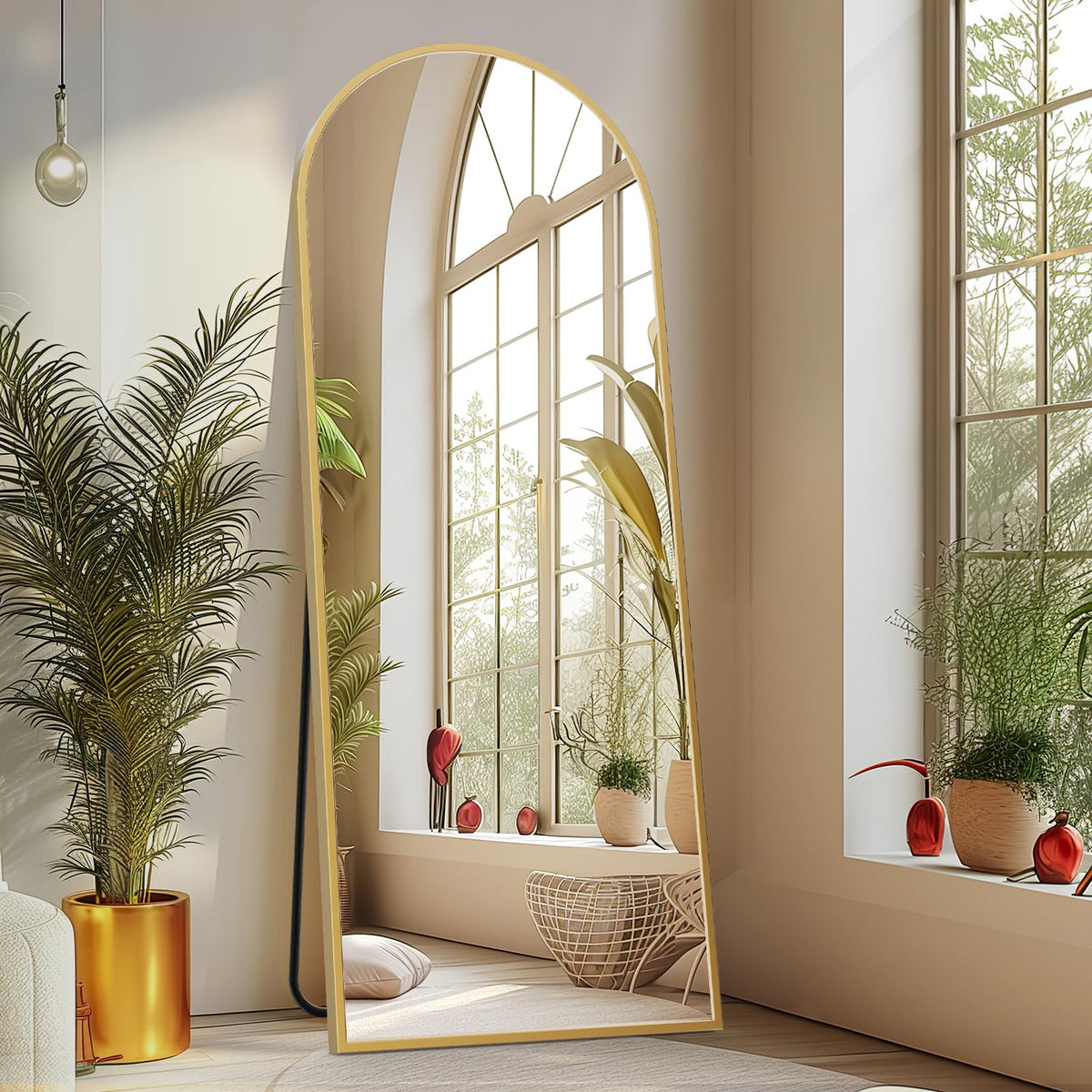 Sweetcrispy arched full-length mirror with gold frame showing full outfit.