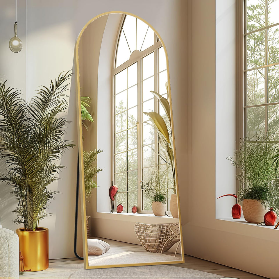 Sweetcrispy arched full-length mirror with gold frame showing full outfit.