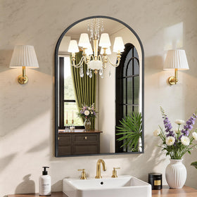Sweetcrispy arched black bathroom mirror over sink for precise grooming.