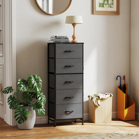 Sweetcrispy dresser top decor featuring lamp and plant on the wood surface.