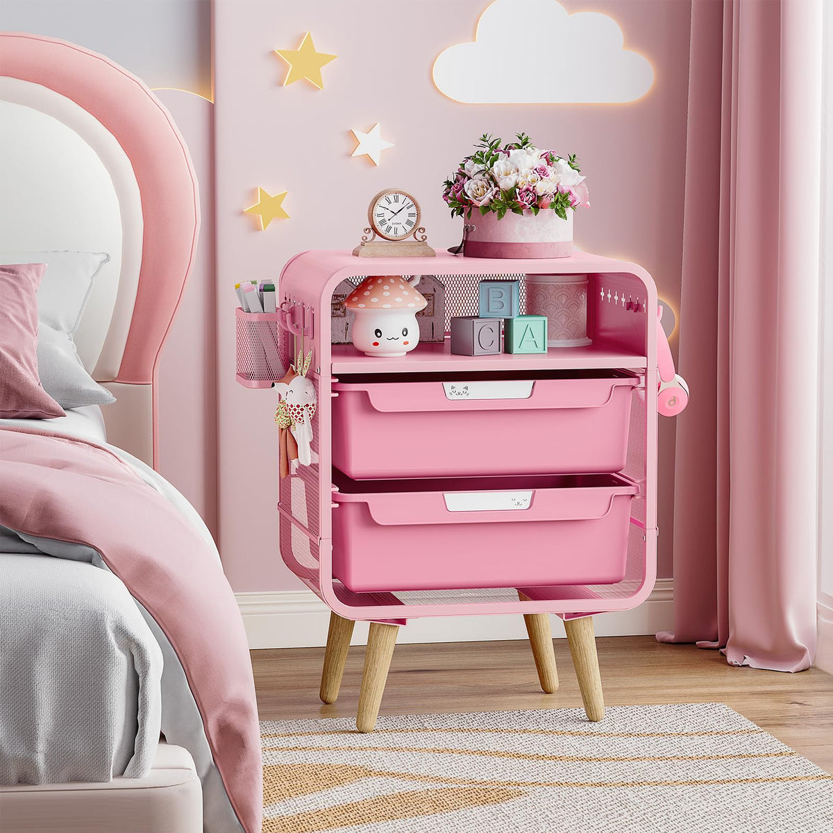 SYKIARIOL pink nightstand uses adjustable legs for level support.