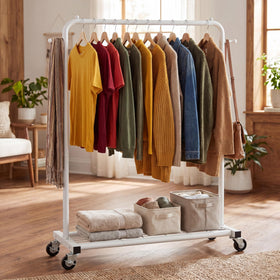 Sywhitta garment rack with mesh storage shelf, side view for extra storage.