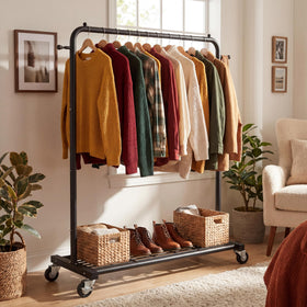 Sywhitta rolling garment rack with sturdy frame ideal for coats and dresses.