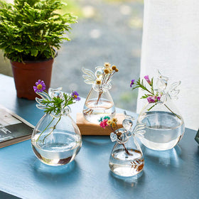Sziqiqi hand-blown glass angel vase showing delicate craftsmanship