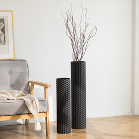 Sziqiqi black cylinder floor vase 27.6in enhances a bold, modern entryway focal point.