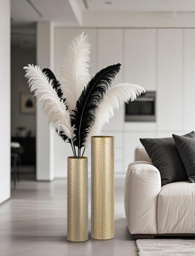 Sziqiqi gold floor vase nests together for compact storage when not in use.
