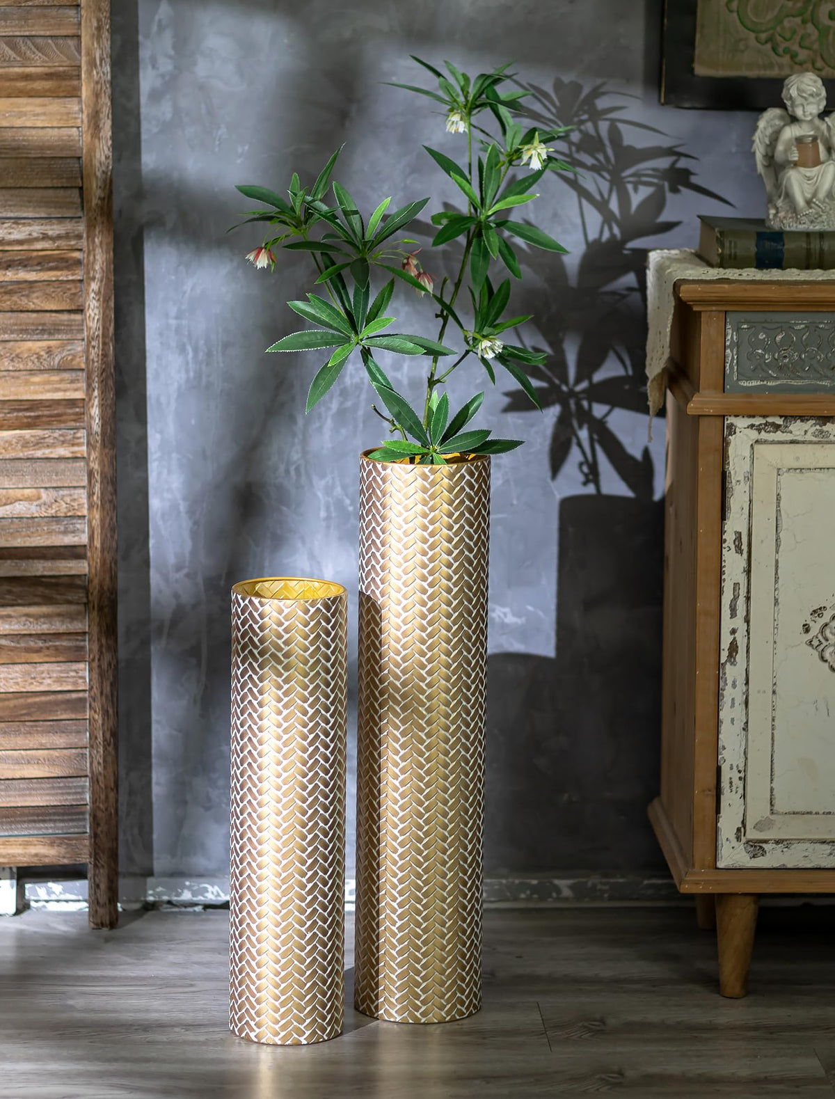 Pair of Sziqiqi gold floor vases with woven texture highlights modern metallic finish for living spaces.