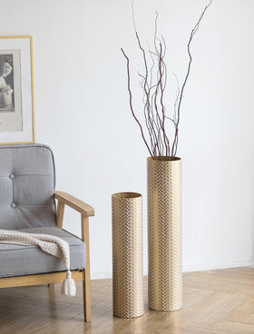 Sziqiqi tall gold floor vase with woven texture in two heights showcases rustic elegance.