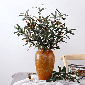 SzJias olive branch features round olives for a realistic Mediterranean accent.