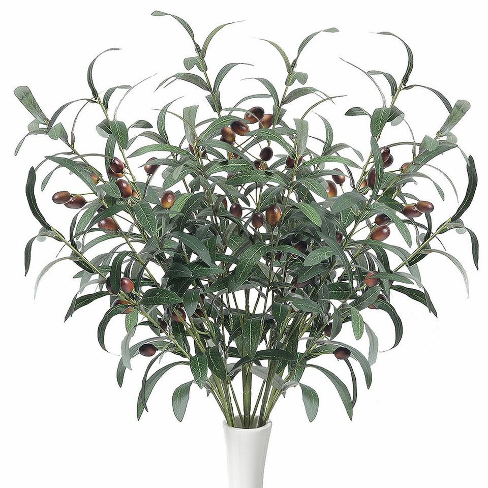 SzJias olive branch with textured leaves adds natural elegance to living room decor.