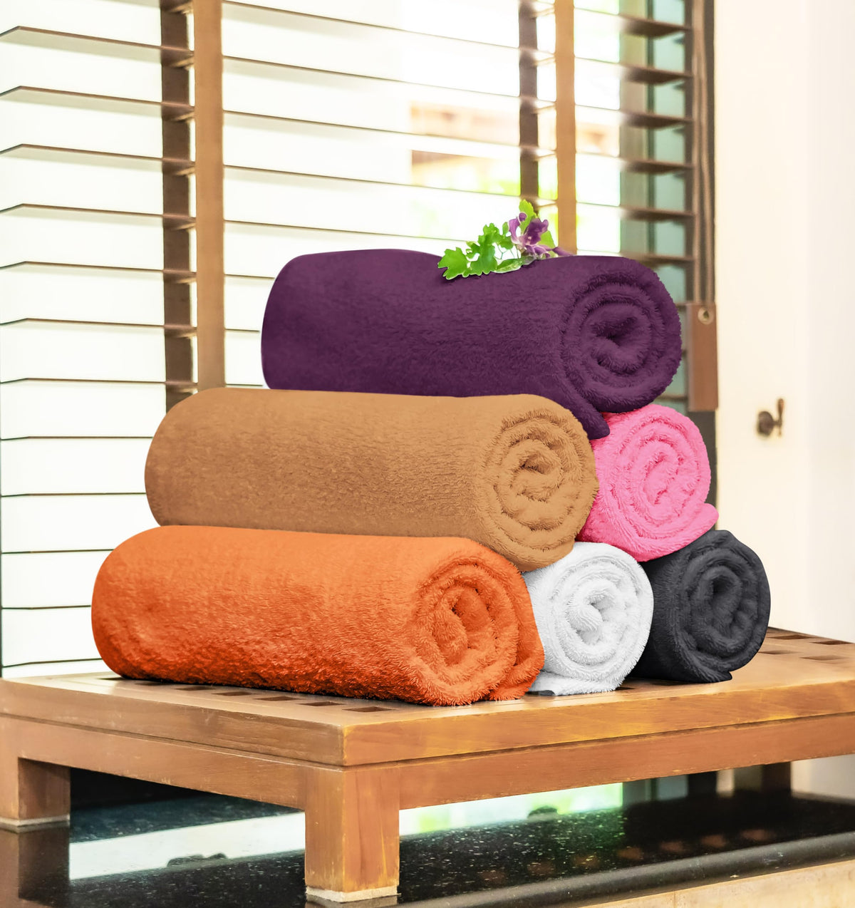 T & L Towel and Linen Mart pink bath towel; lightweight and quick-drying for gym bags.