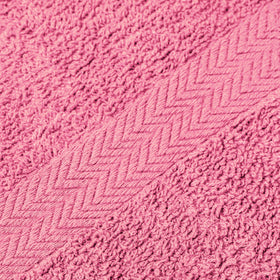 T & L closeup stitching on bath towel; reinforced edges for durability.