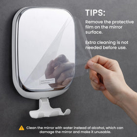 TAILI fogless mirror in clear acrylic surface for fog-free shaving.