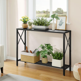 Tajsoon console table close-up of black finish and sturdy frame.