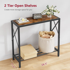 Tajsoon console table decorative ideas with plants and candles.