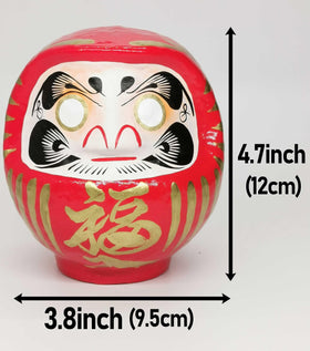 Takasaki Daruma red doll, back view, authentic Japanese village craft.