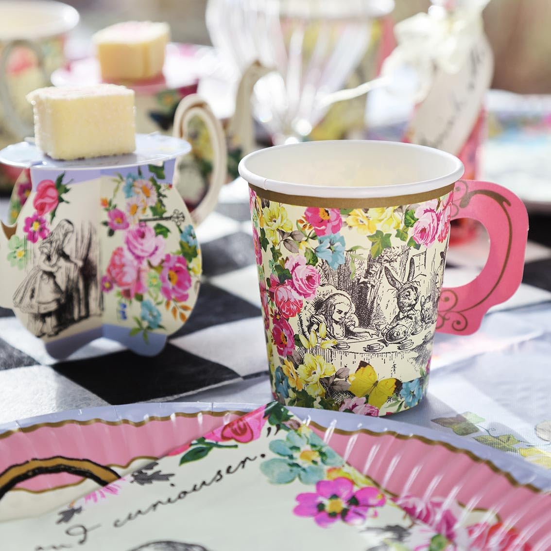 Talking Tables Alice napkins highlight coordinated decor for cohesive party tables.