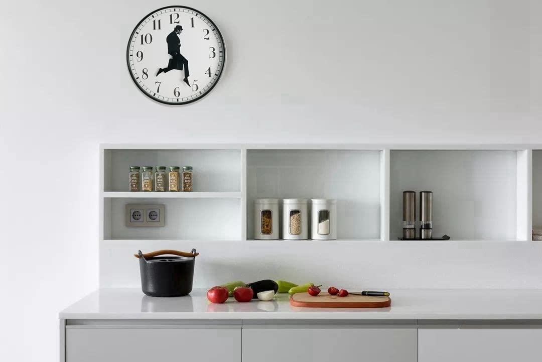 Tankrin Ministry of Silly Walks Clock black bezel enhancing a modern dial for style.