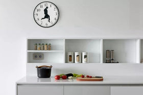 Tankrin Ministry of Silly Walks Clock black bezel enhancing a modern dial for style.