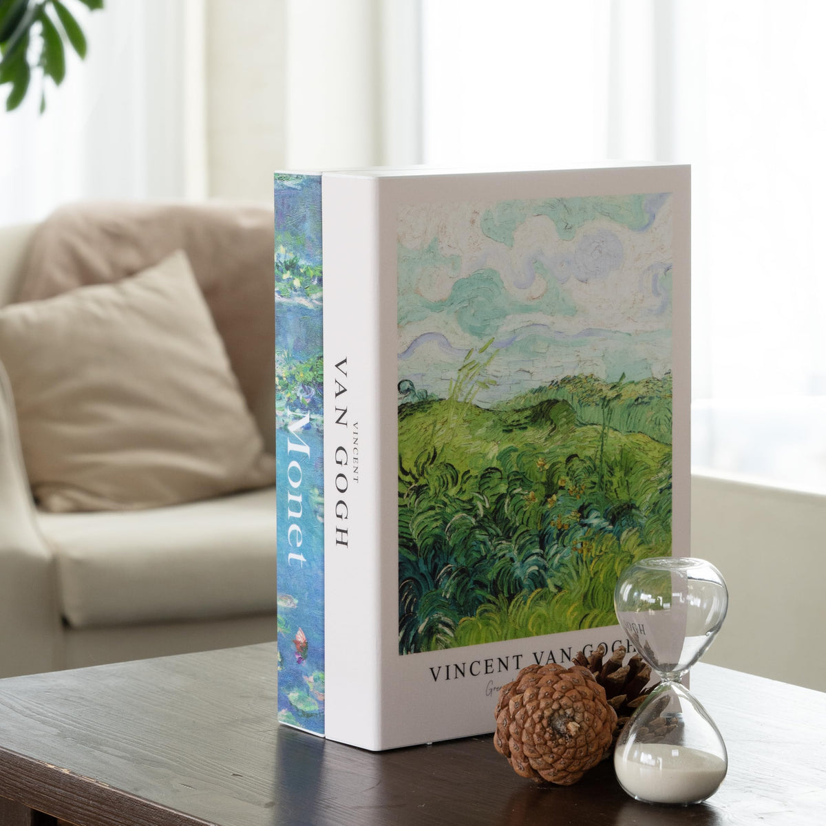 TastePick book-shaped cable box with Gogh Monet design hides cables neatly on a stylish desk.