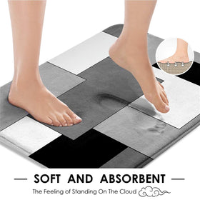 Tayney grey geometric bath mat offers soft comfort and quick dry performance.