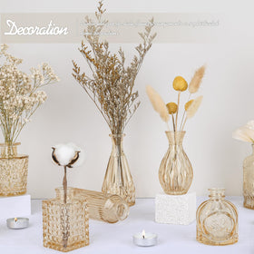 TBWIND thick-glass bud vase highlights blooms with sturdy construction.