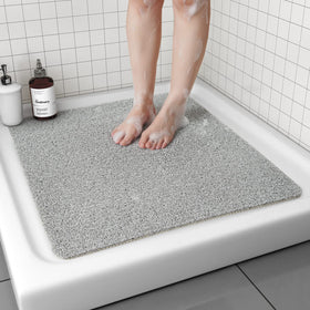 tchdio non-slip shower mat on textured surface for safer showers