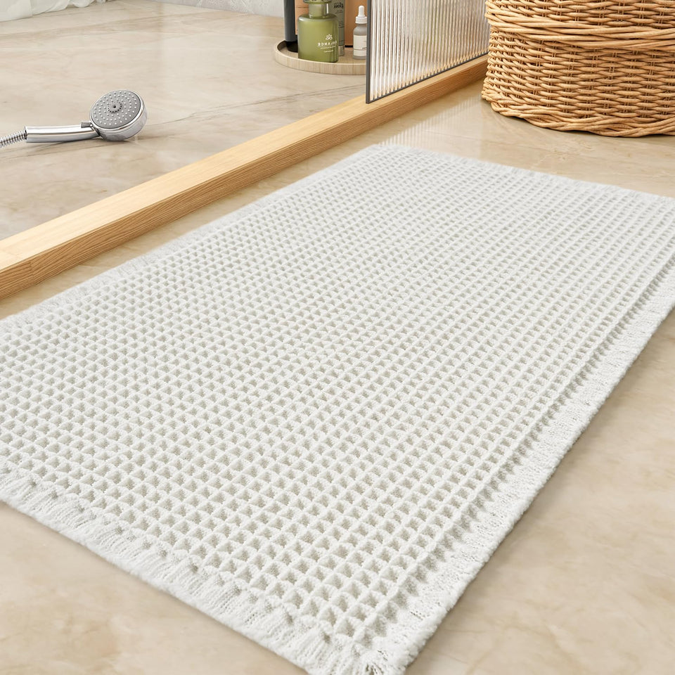 Tchdio waffle bath mat close-up showing absorbent texture for quick water pickup