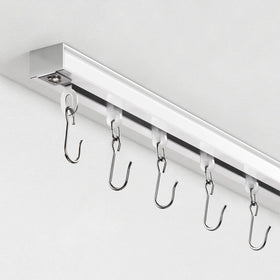 TEAKMAMA ceiling curtain track assembly showing quick installation for room dividers.