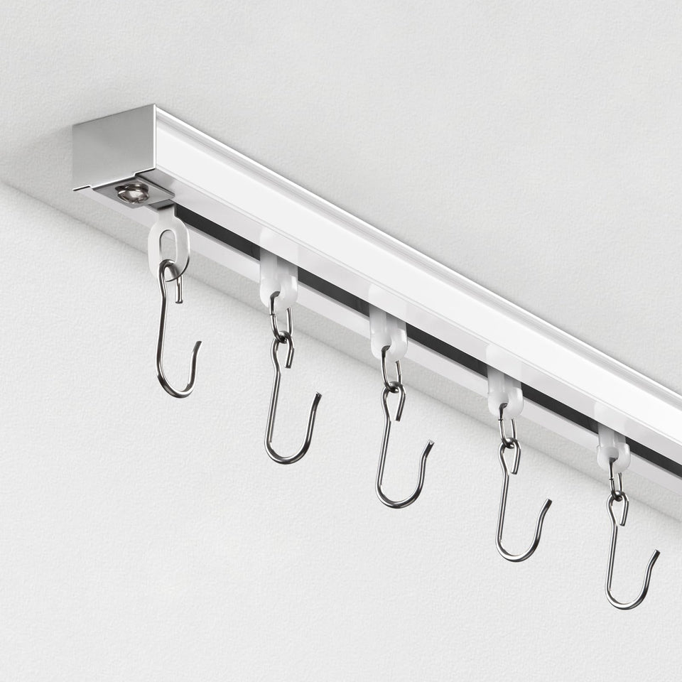 TEAKMAMA ceiling curtain track assembly showing quick installation for room dividers.