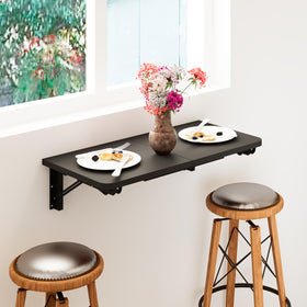 TEAMIX wall-mounted folding table with heavy-duty brackets for stability.