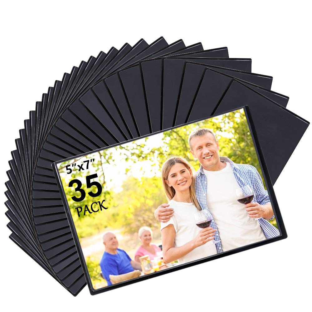 Tebik 35-pack magnetic frame on fridge displays 5x7 photos securely.