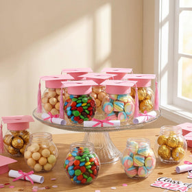 Close-up of pink tassel and graduation cap lid on Teenyyou jar