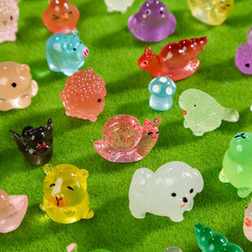 Teenzee glow resin dog figure for nocturnal displays and fairy gardens.